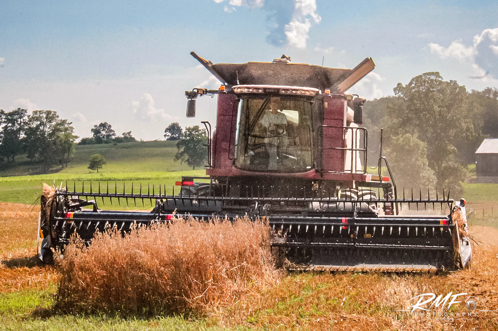 Combine harvester working a Pennsylvania field