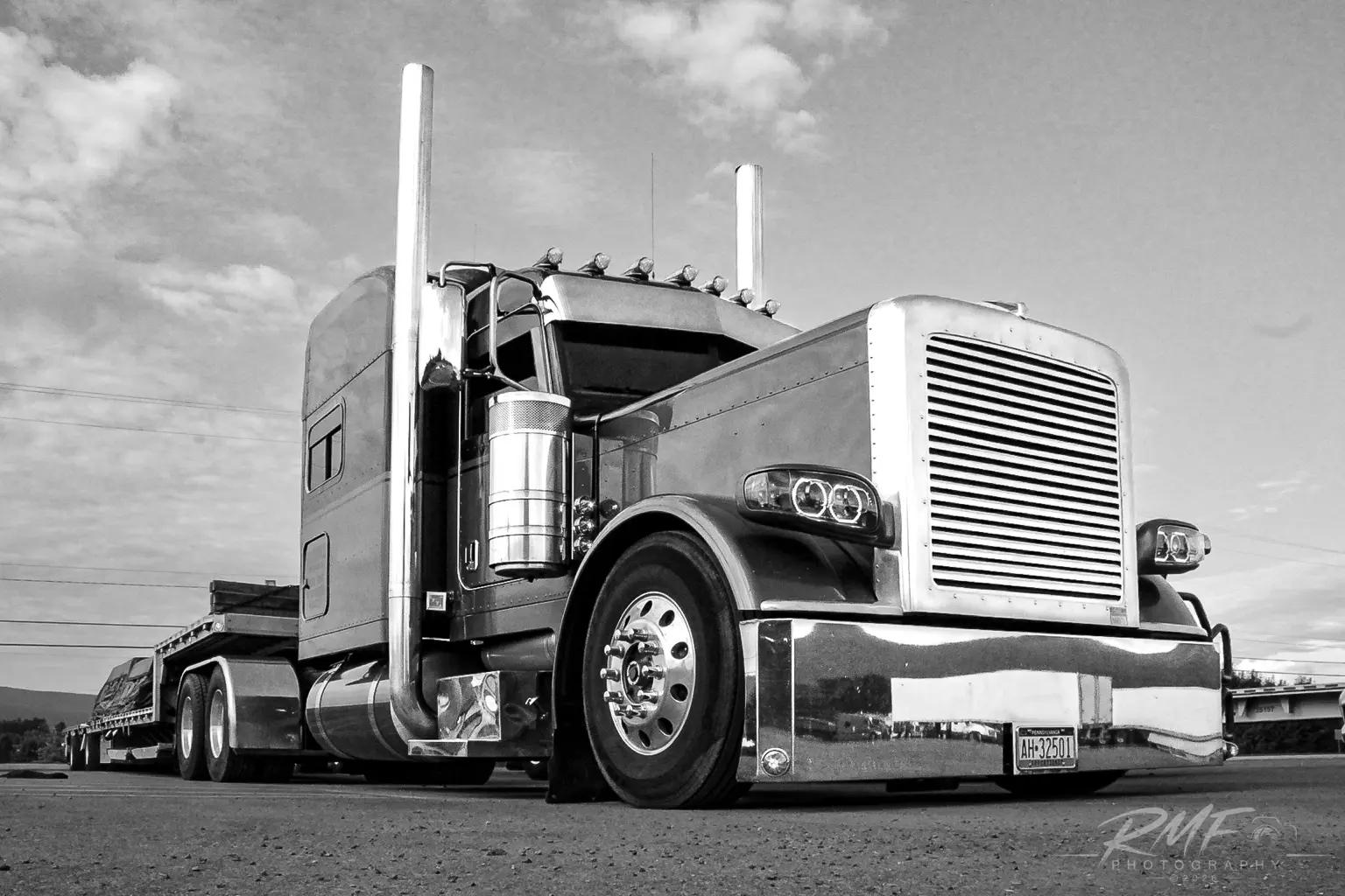 Black and white portrait of a classic long-nose truck