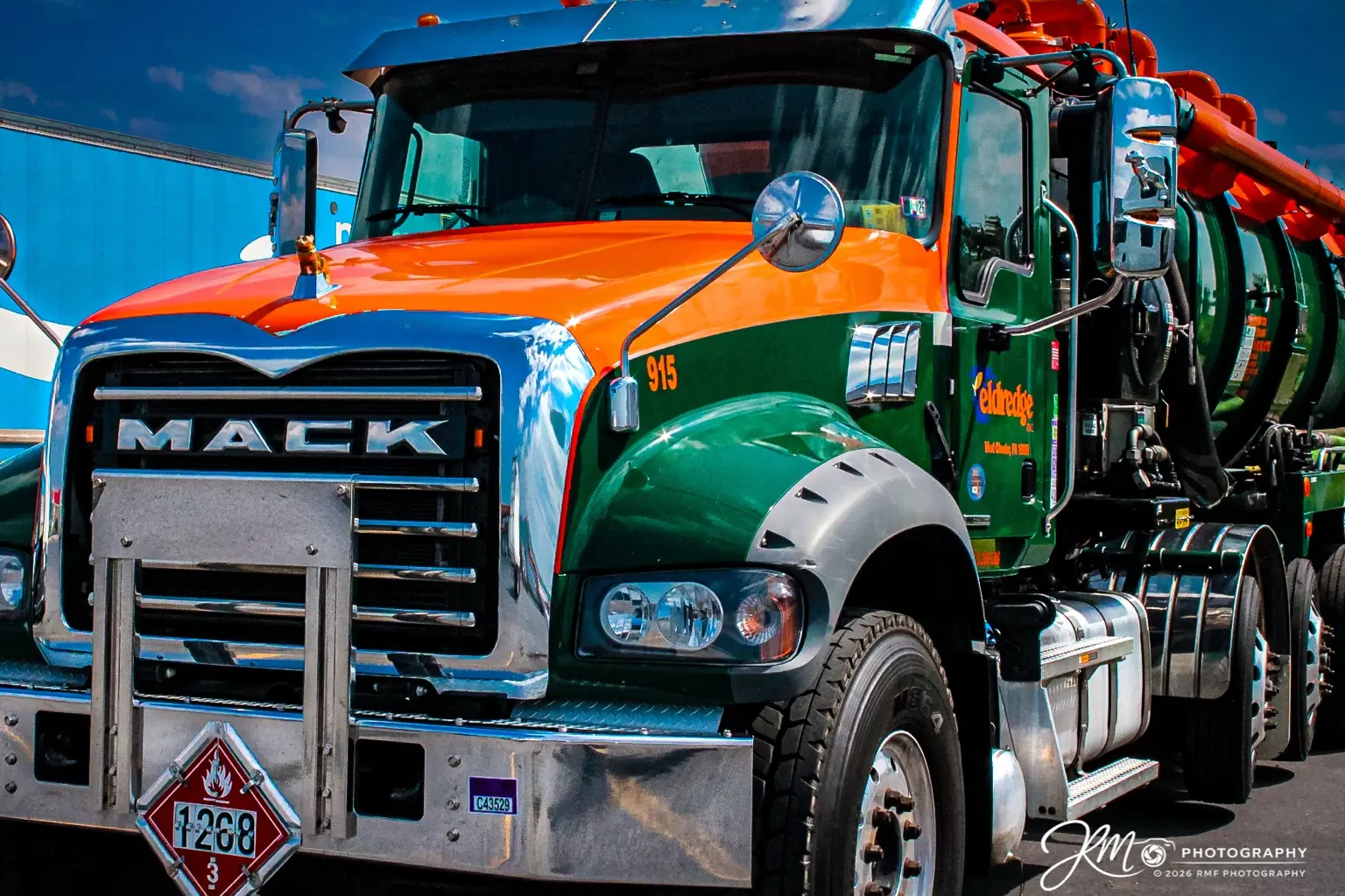Green and orange Heritage Mack tanker truck