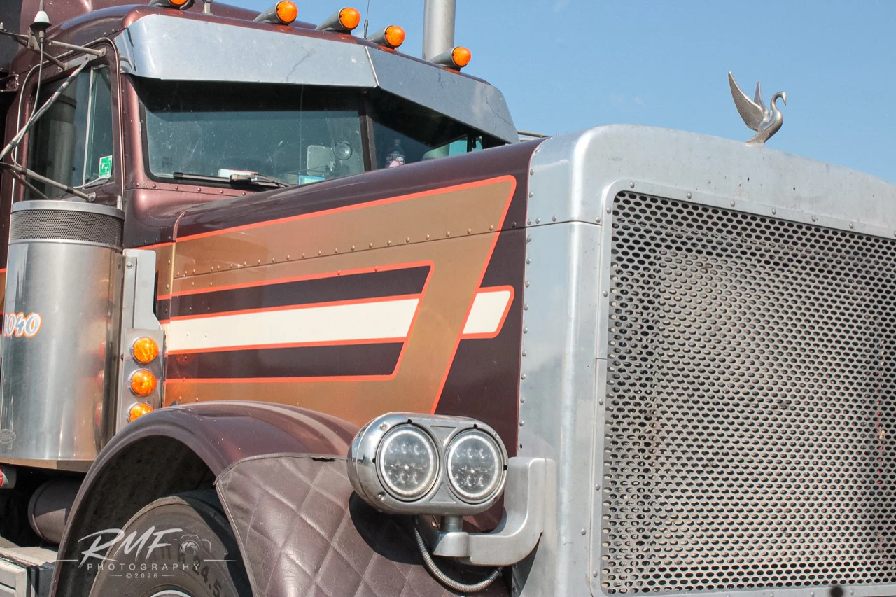 Close color detail of a maroon classic long-nose truck
